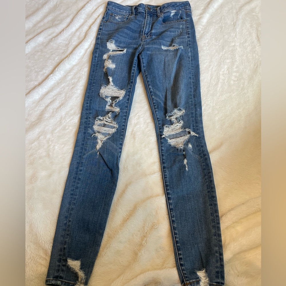 Dark blue ripped women’s jeans